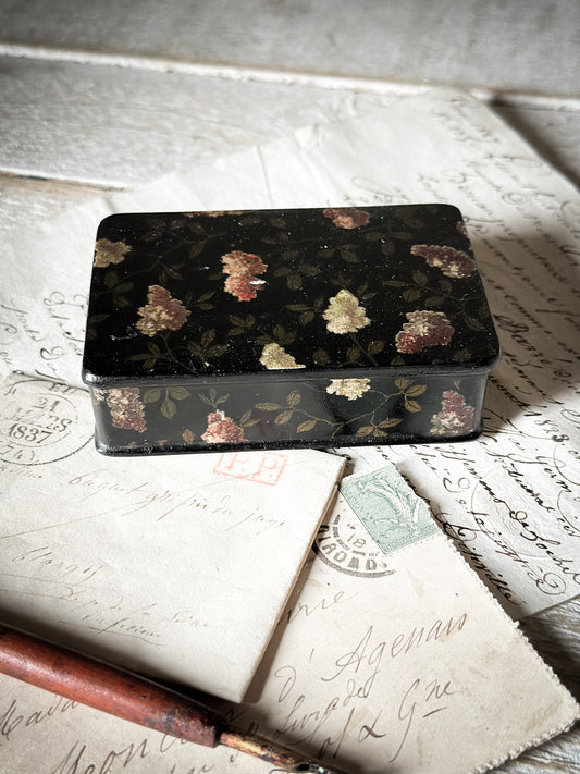 A lovely Victorian black lacquered papier mache stamp box