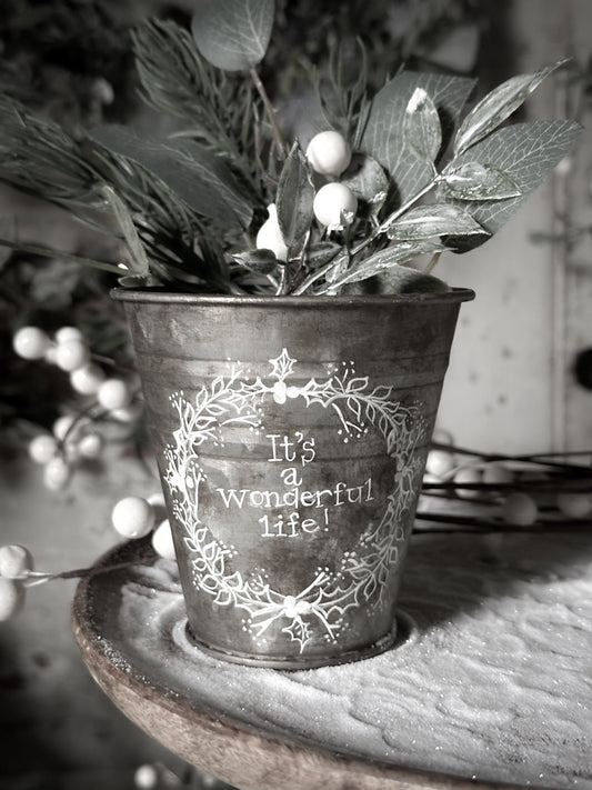 A vintage style mini zinc tub hand painted with a Christmas wreath and Quote