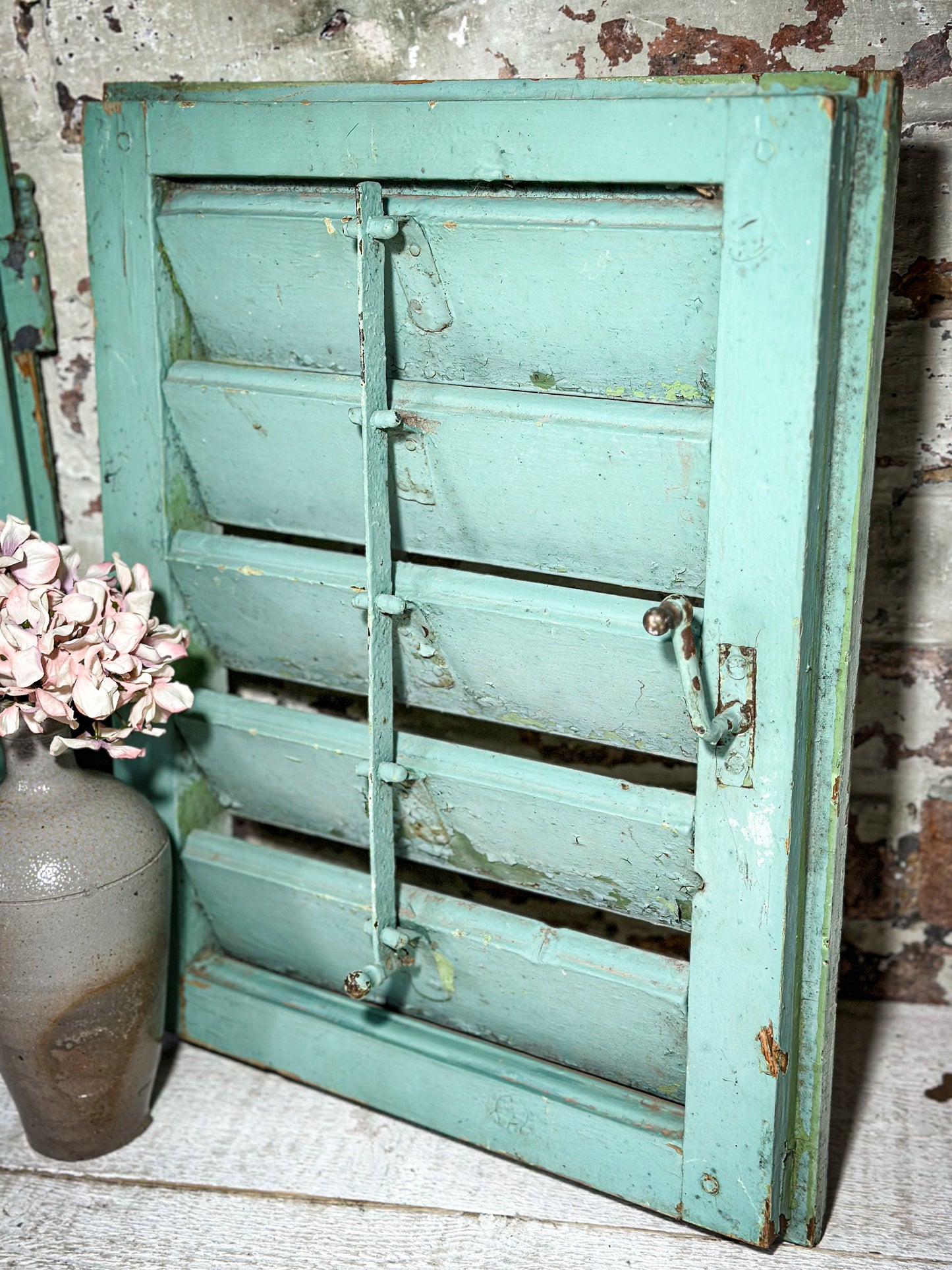 A Pair of French Green Chippy Painted Shutters