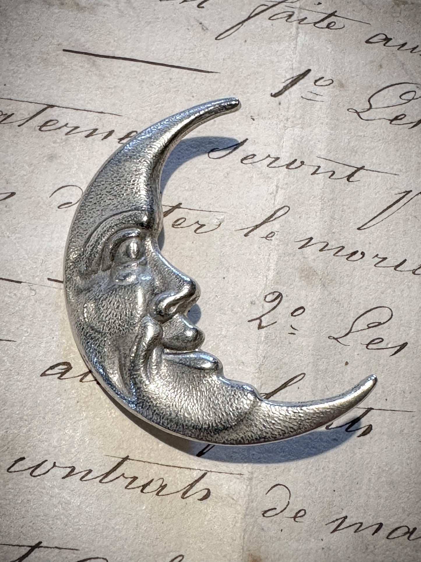 Fabulous white metal man in the moon crescent brooch