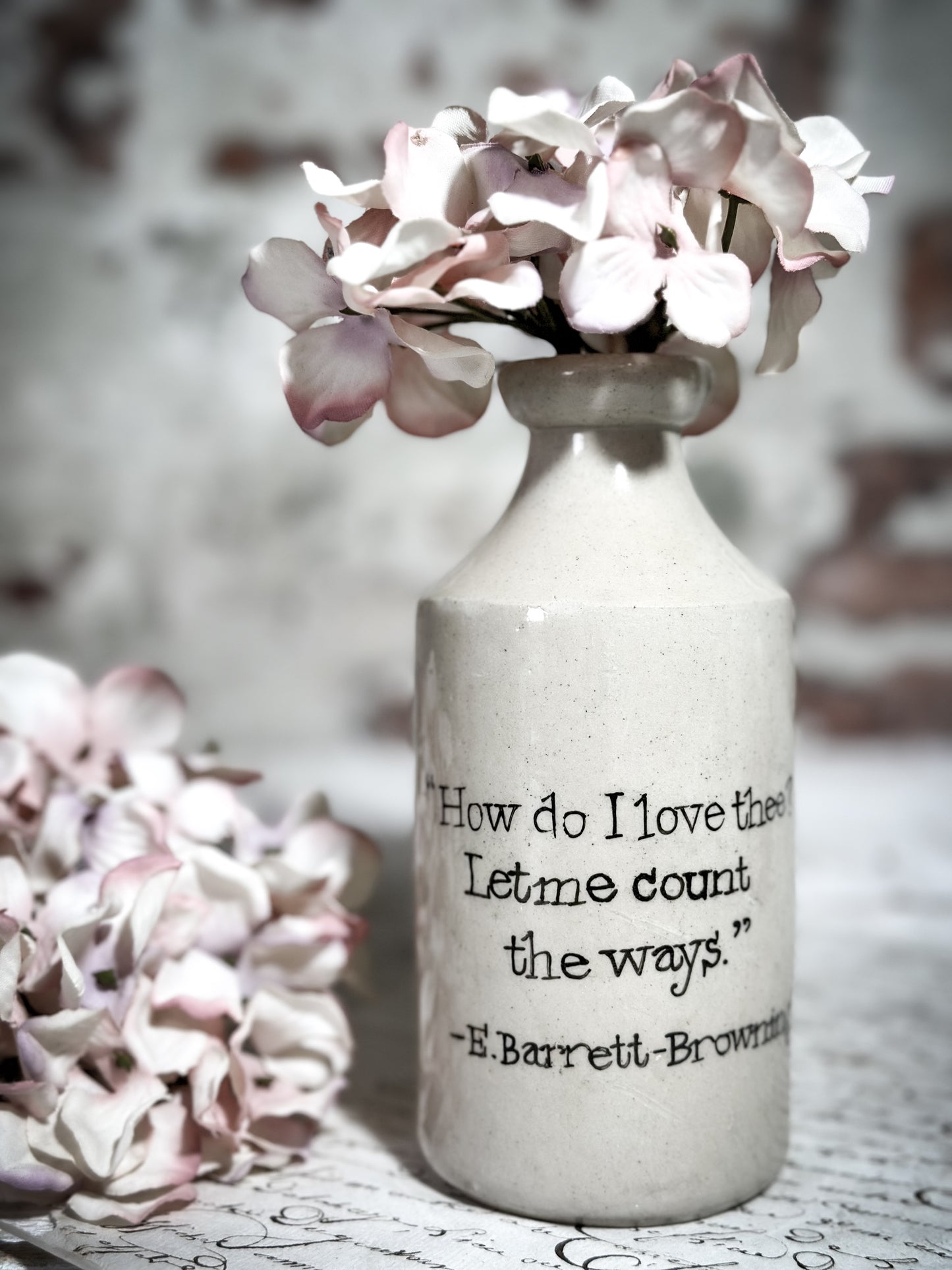 An Antique Pottery Bottle with a Hand Painted Valentine’s Day Quote