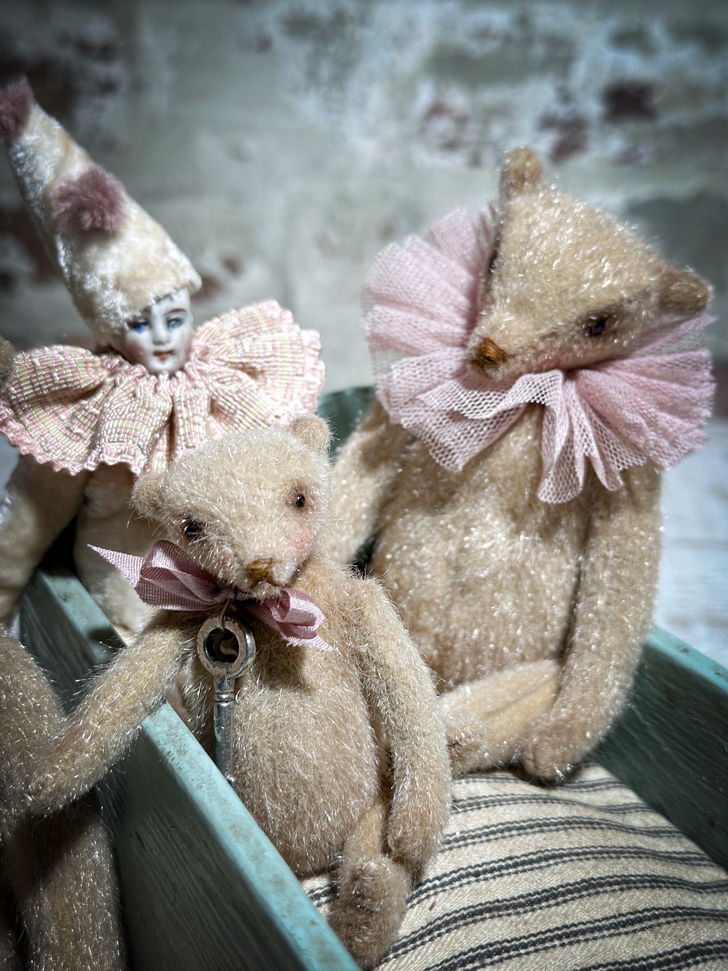 A beautiful hand made jointed collector’s doll teddy bear with bunny pyjamas