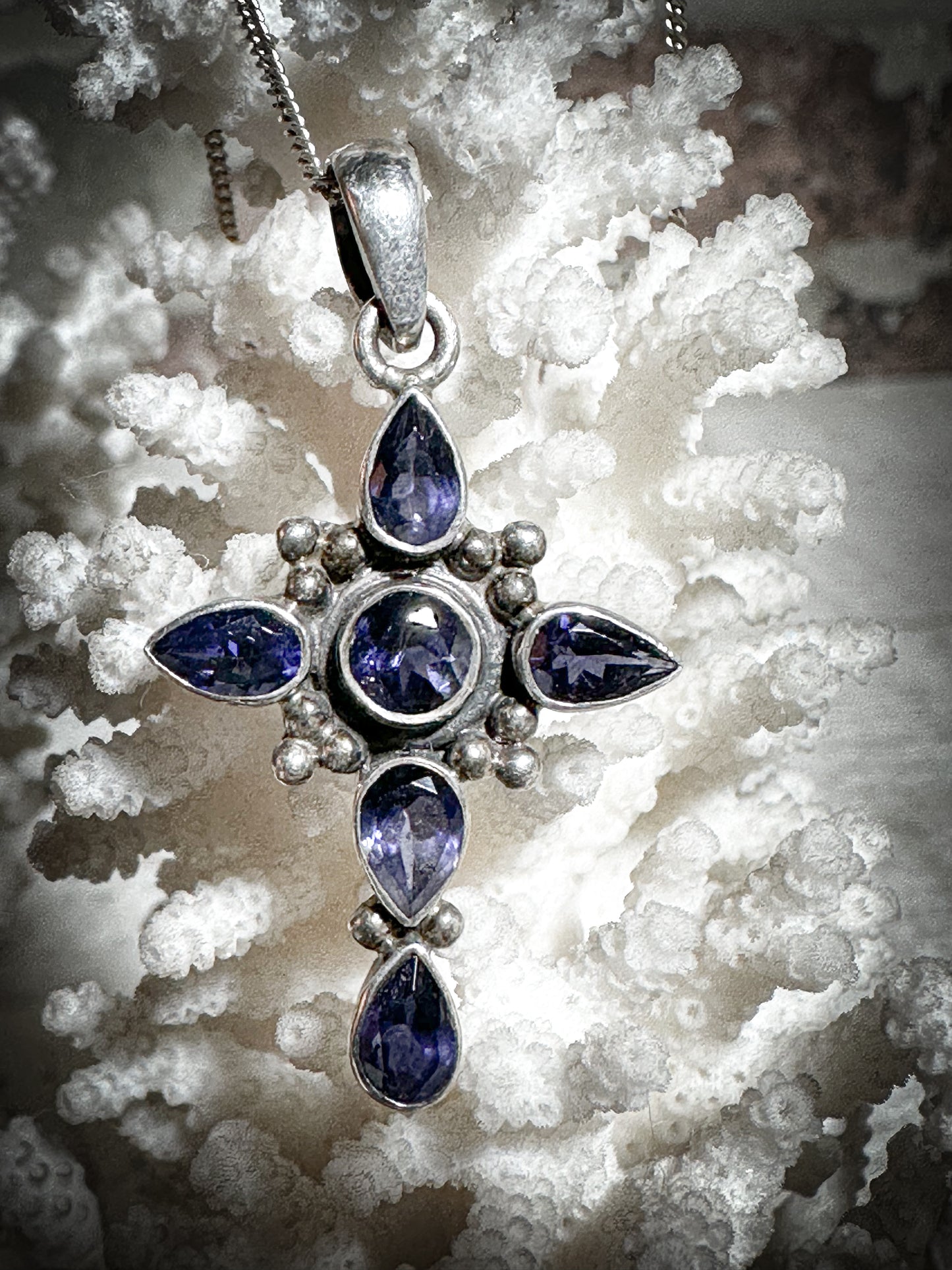 A vintage silver and Tanzanite crucifix