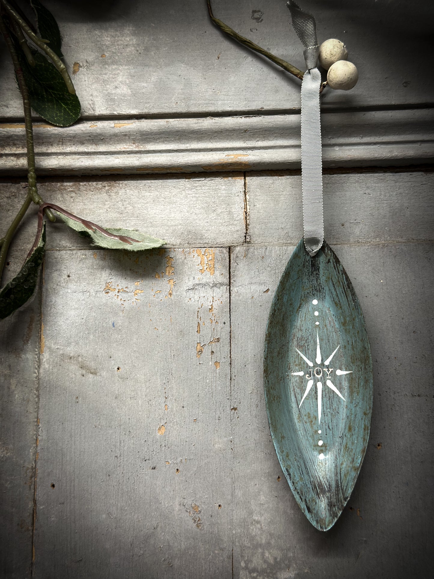A Reworked French Patisserie Tin Christmas Decoration Stamped and Painted “Joy”