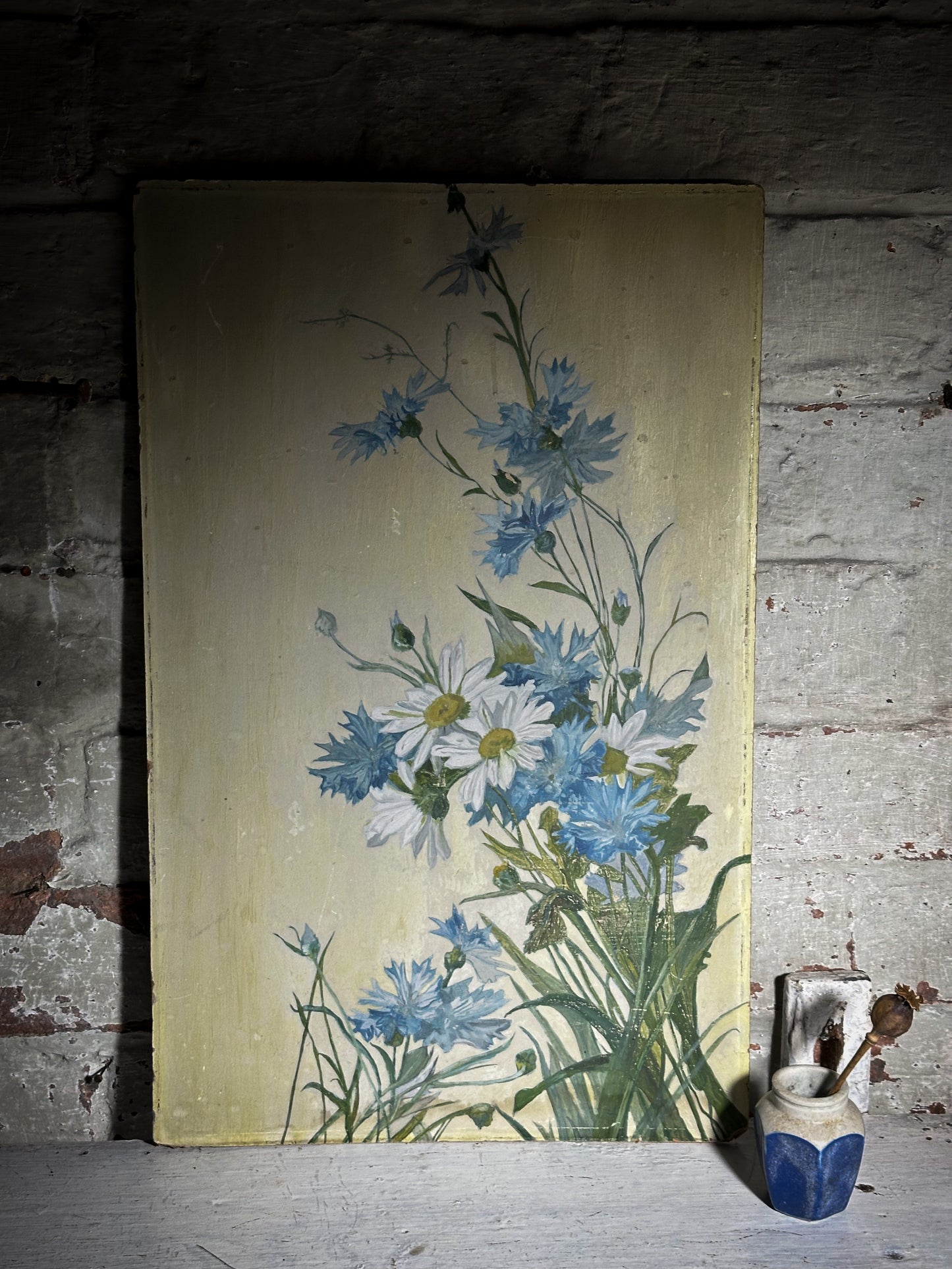 A Vintage oil on board painting of Daisies and Cornflowers