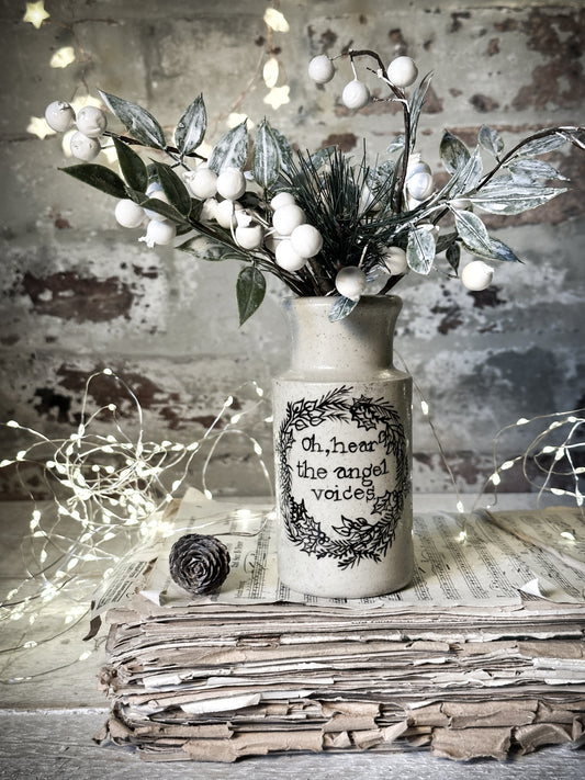 A hand painted and illustrated vintage Victorian bottle