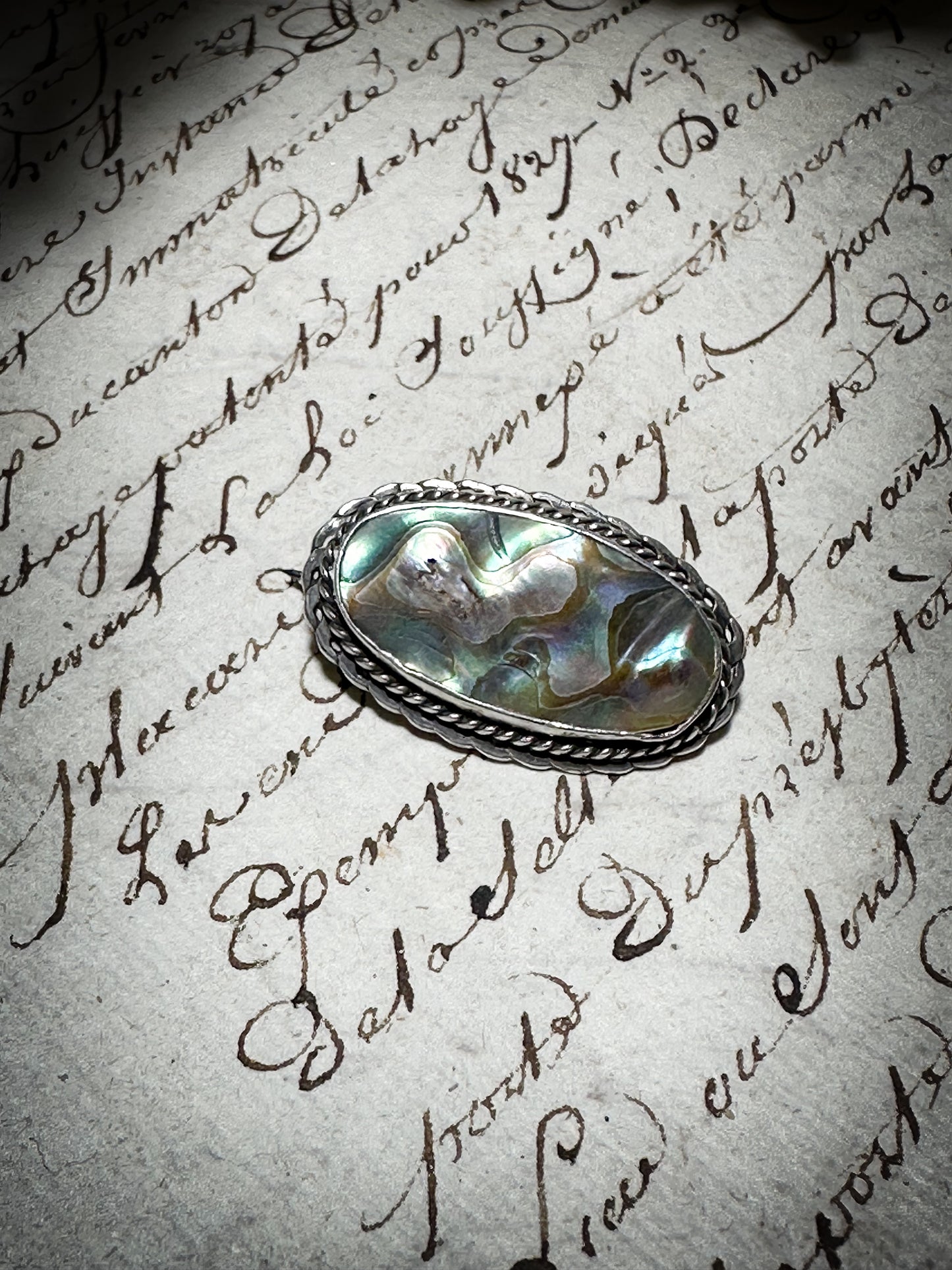 A lovely antique silver Paua brooch