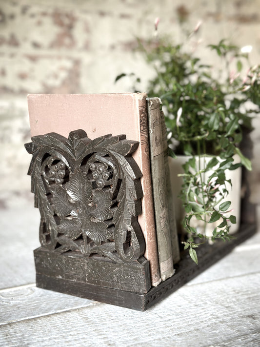 A beautiful Black Forest hand carved book slide