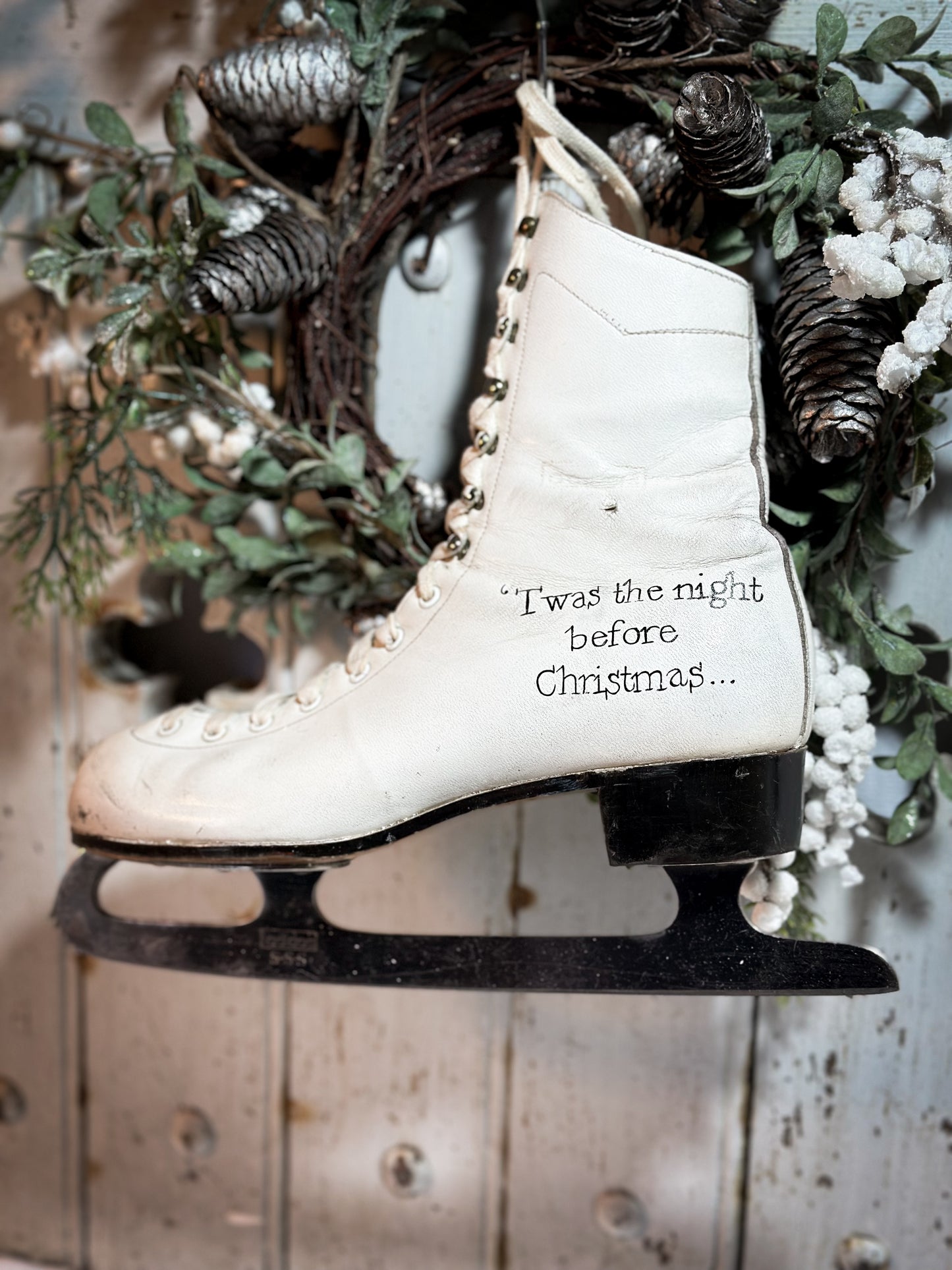 A beautiful vintage Christmas ice skate hand painted using traditional sign writer’s techniques and materials