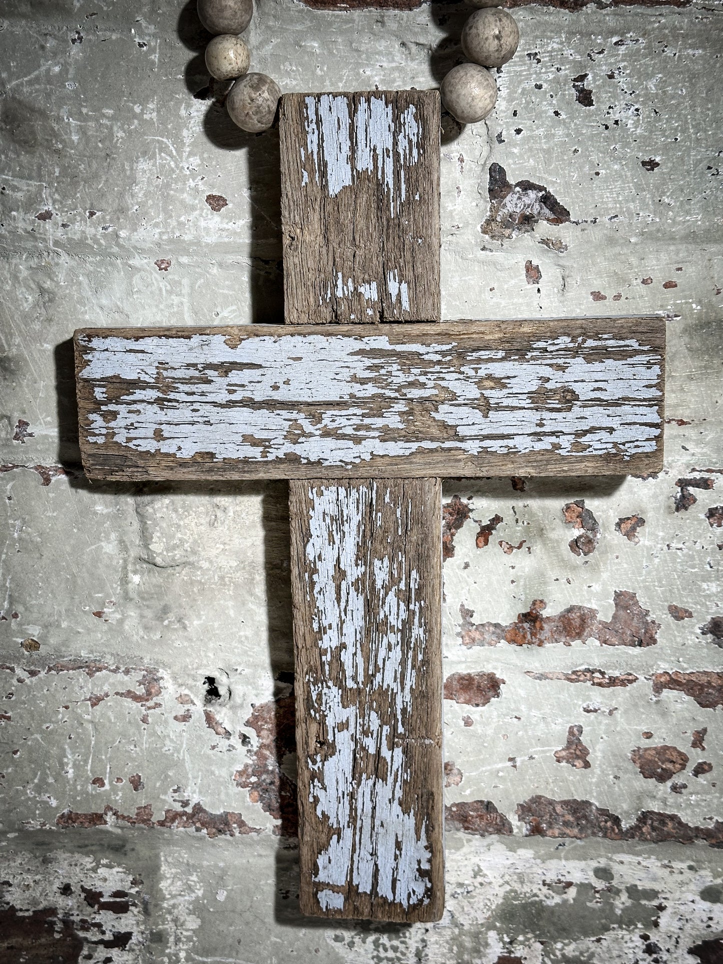 A beautiful hand made recycled wooden oversized crucifix or rosary