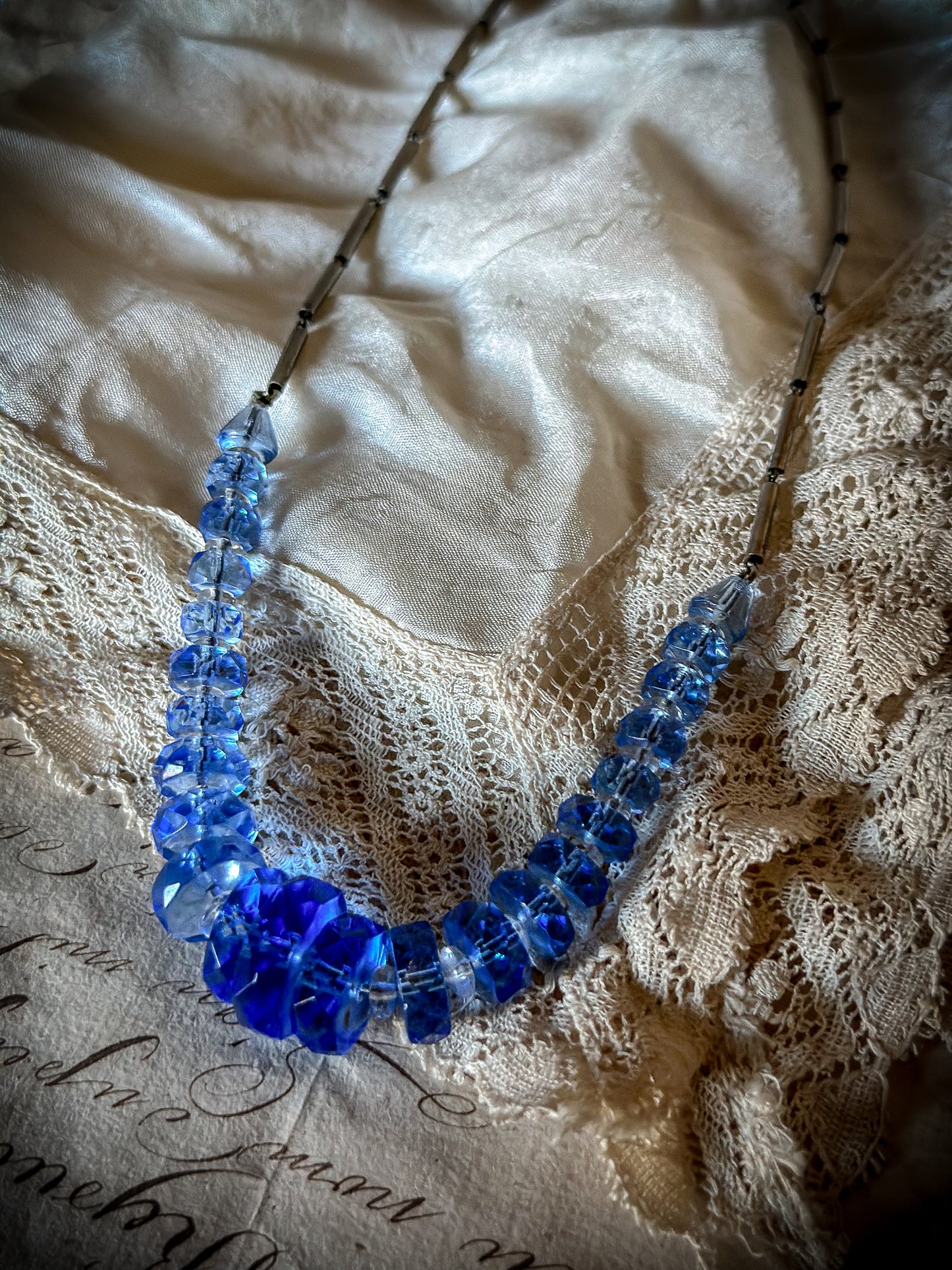 A stunning antique Czech crystal blue and clear stacking necklace