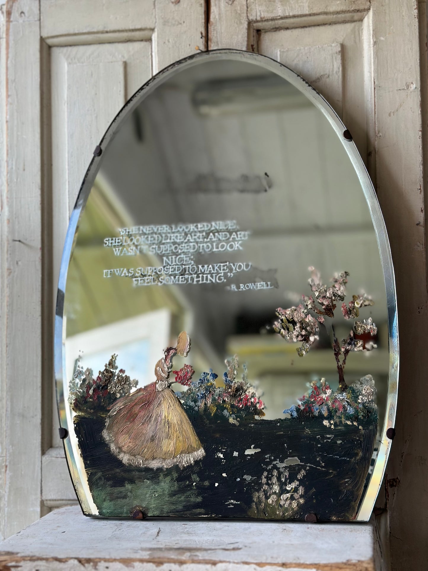 A beautiful antique painted mirror with a hand painted quote