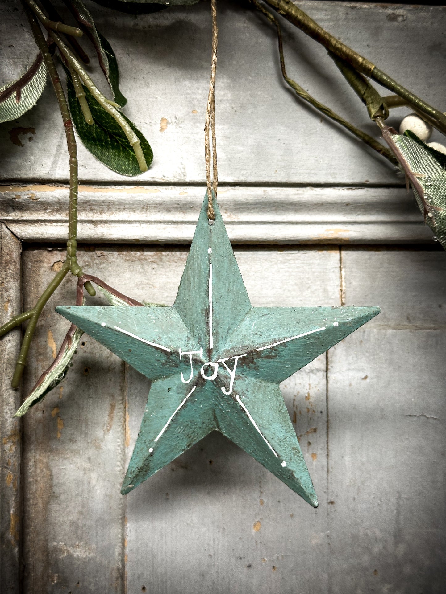 A Large Turquoise Tin Barn Star Christmas Decoration “Joy”