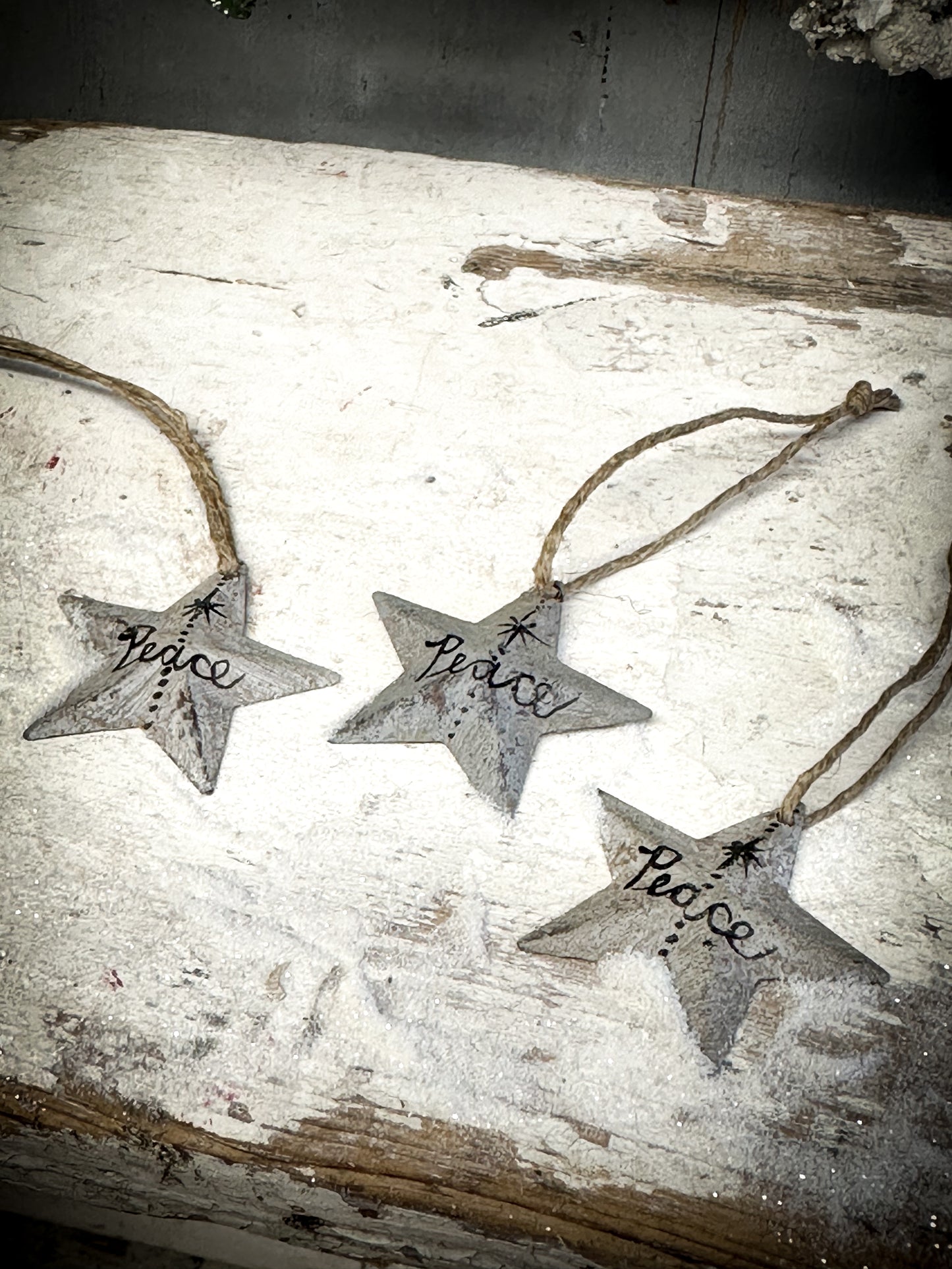 A Mini Grey Tin Barn Star Christmas Decoration “Peace”