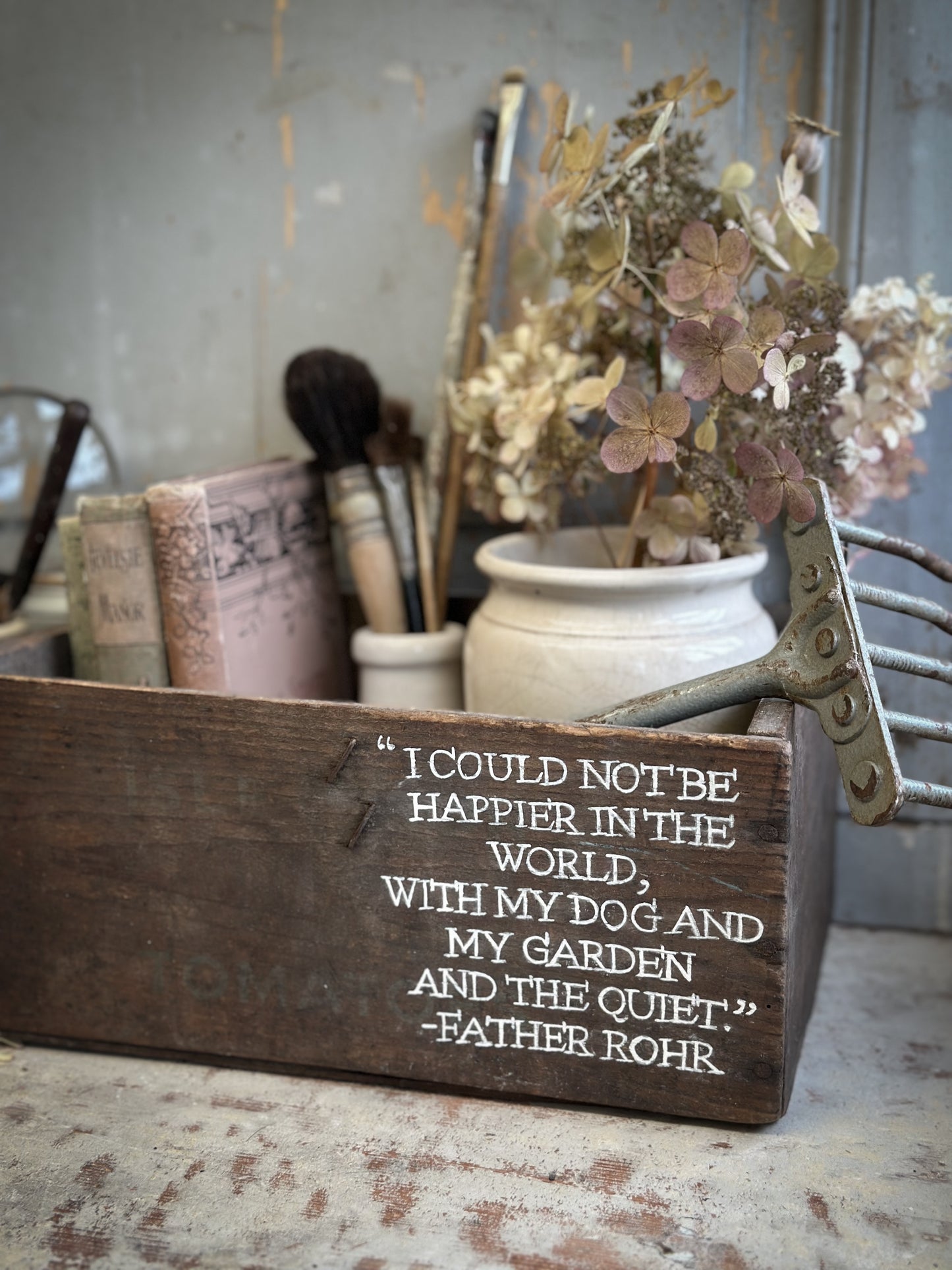 A Vintage Wooden Tomato Crate With Hand Painted Quote