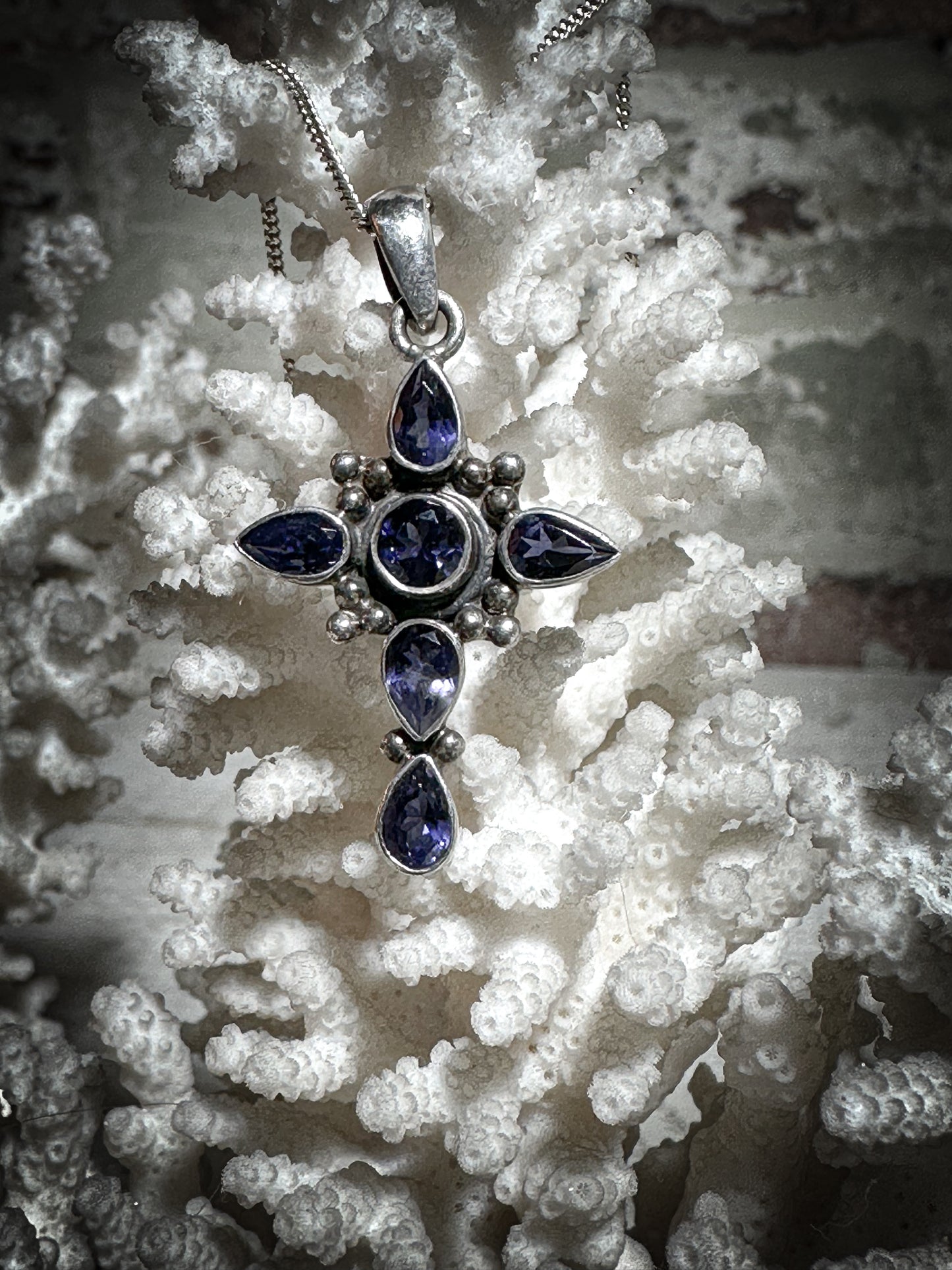 A vintage silver and Tanzanite crucifix