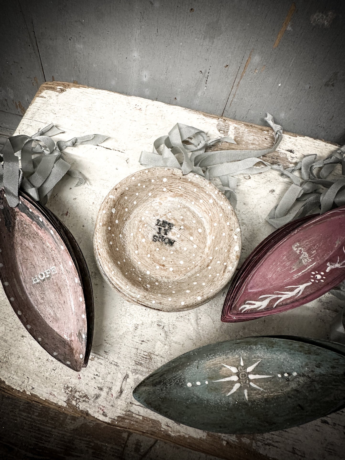 A Reworked French Patisserie Tin Christmas Decoration Stamped and Painted “love”