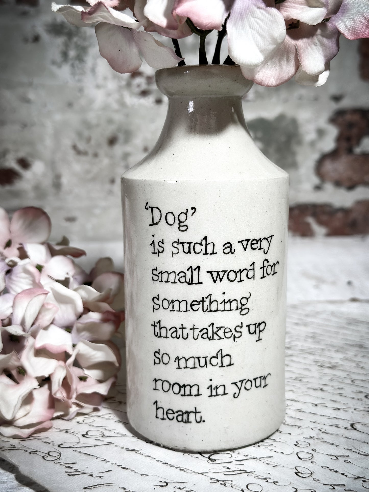 An Antique Pottery Bottle with a Hand Painted Inspirational Quote