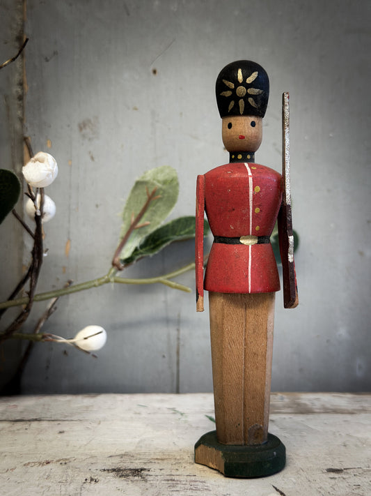 Mid-Century Hand-Painted Wooden British Guardsman (c. 1950s–1960s)