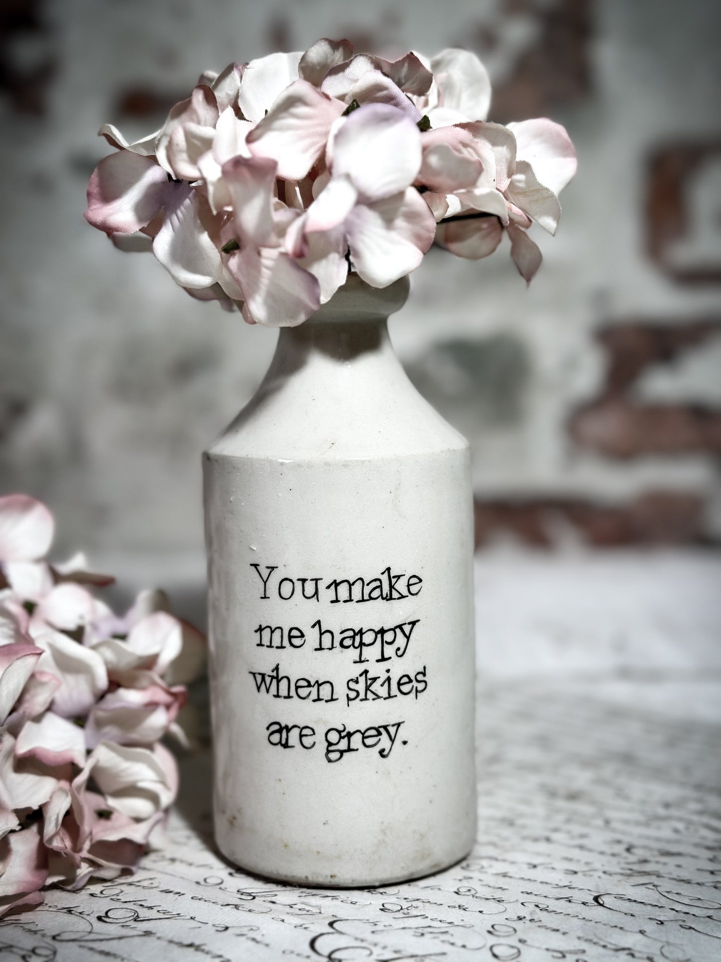 An Antique Pottery Bottle with a Hand Painted Valentine’s Day Quote