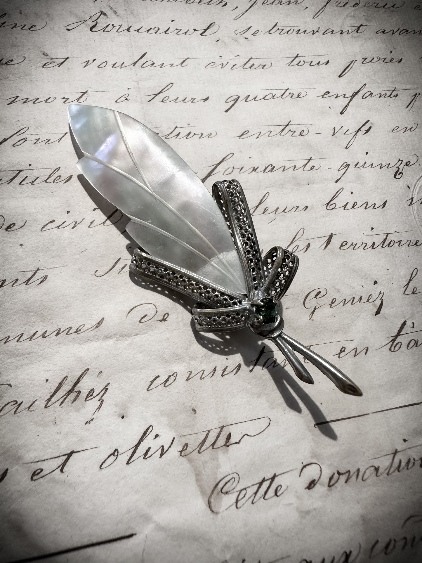 Antique mother of pearl feather brooch