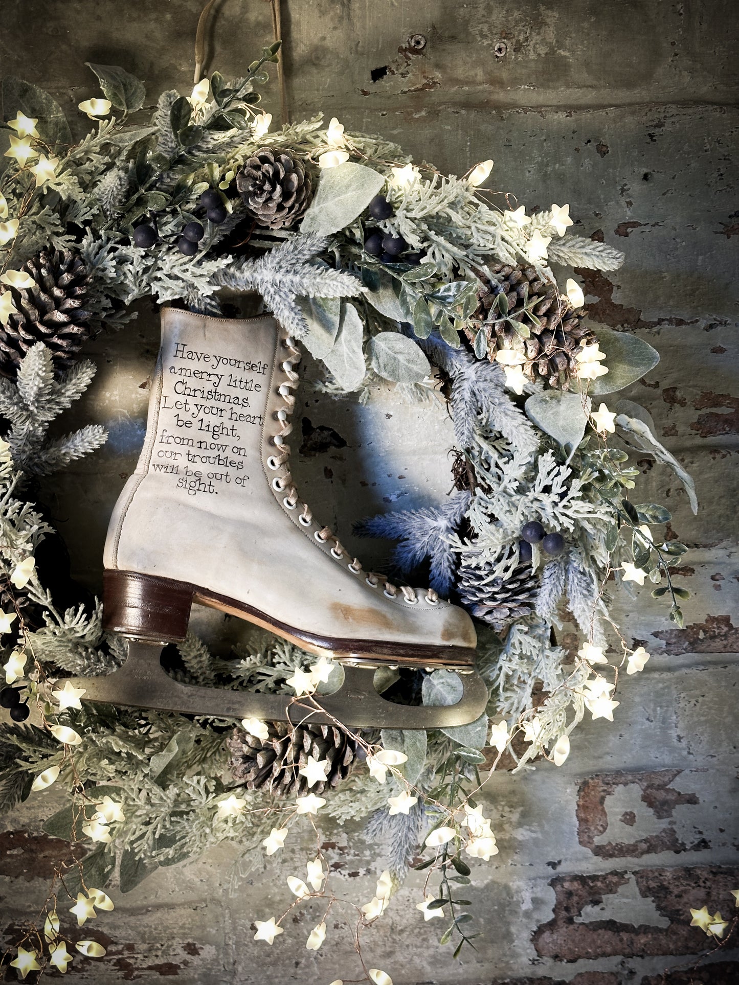 A beautiful vintage Christmas ice skate hand painted using traditional sign writer’s techniques and materials