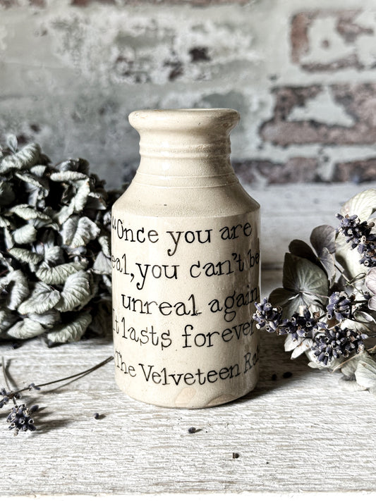 A Victorian unearthed short stoneware pottery bottle with a hand painted quote