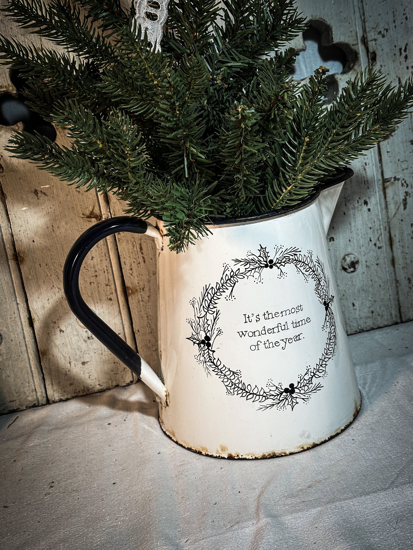 A hand painted quote on a beautiful Vintage white enamelware jug