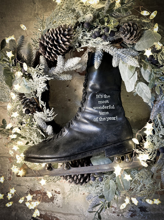 A beautiful vintage Christmas ice skate hand painted using traditional sign writer’s techniques and materials