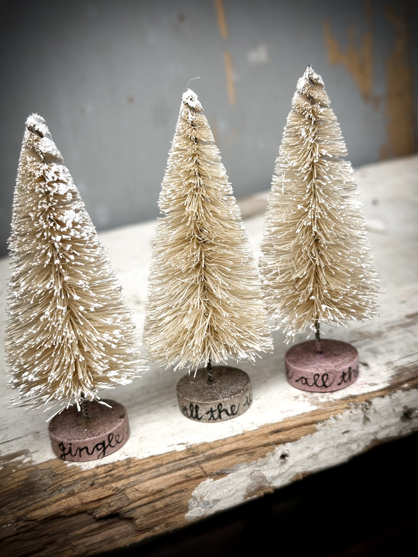 A Medium Painted Bottle Brush Tree “Love & Joy”