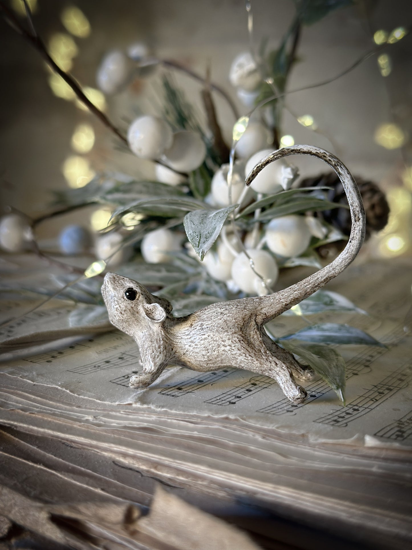 A cold painted brass “night before Christmas mouse”