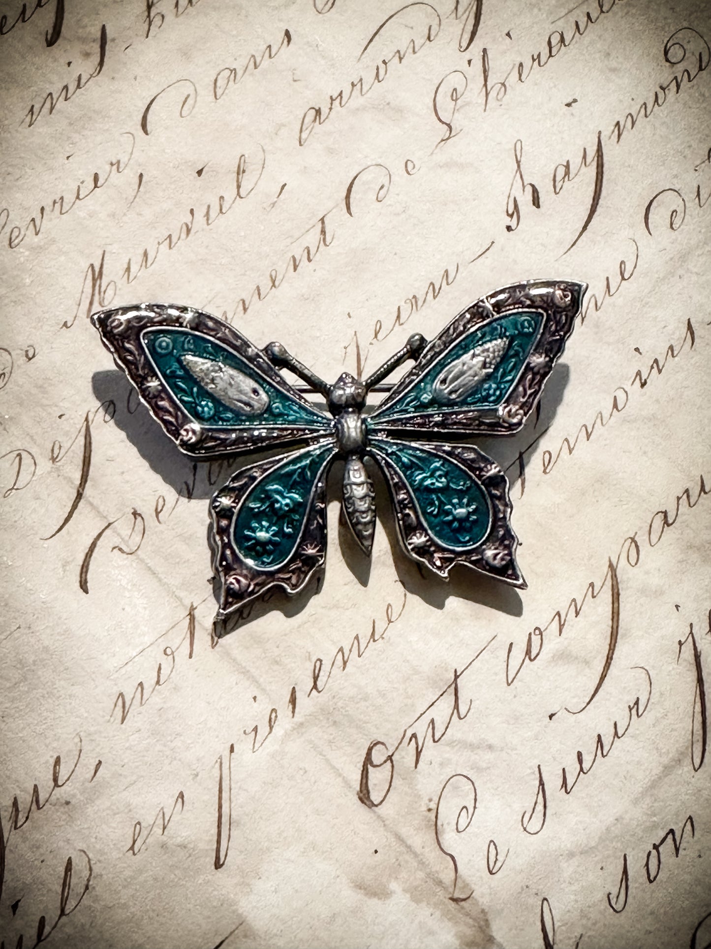 A pretty vintage enamel butterfly brooch