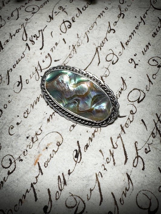 A lovely antique silver Paua brooch