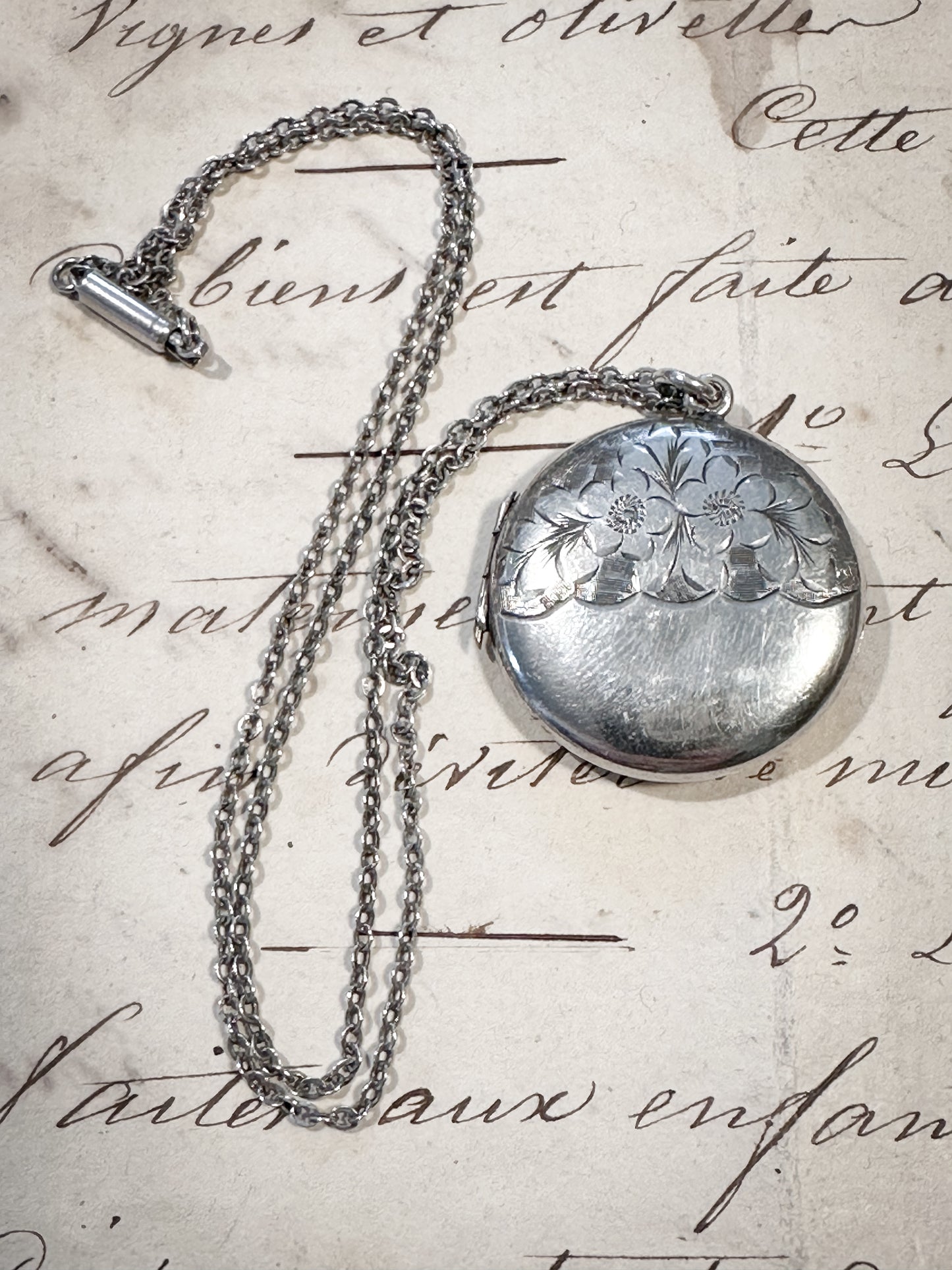 Antique silver Aesthetic movement locket and chain