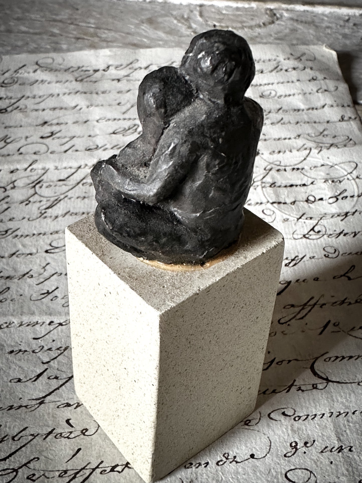 A Vintage Mini Sculpture of an Embracing Couple