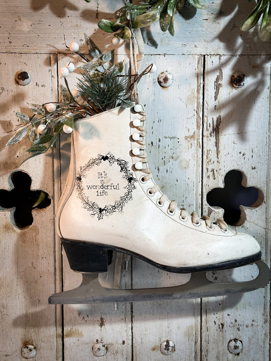 A beautiful vintage Christmas ice skate hand painted using traditional sign writer’s techniques and materials