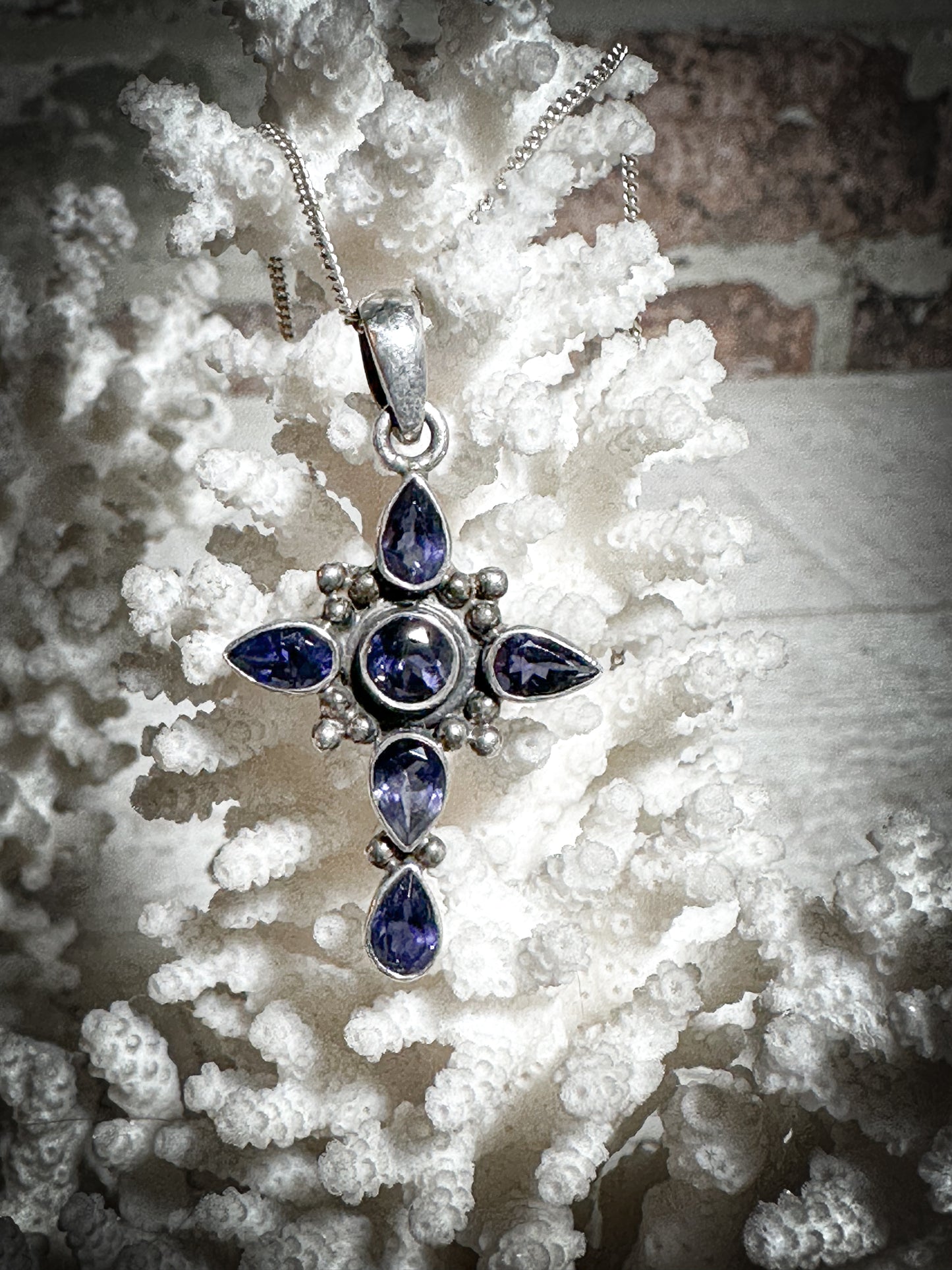 A vintage silver and Tanzanite crucifix