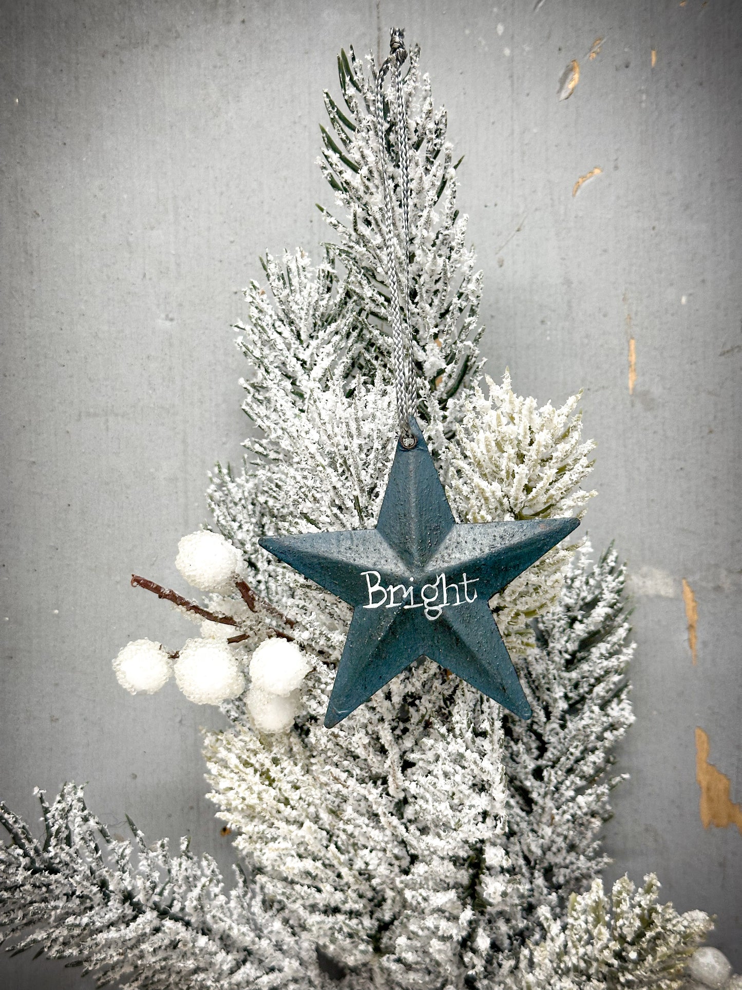 A medium Teal Tin Barn Star Christmas Decoration “Bright”