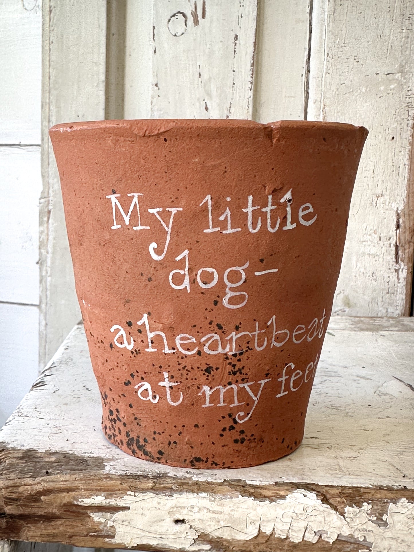 A Victorian terracotta pot with a quote “ My Little Dog”