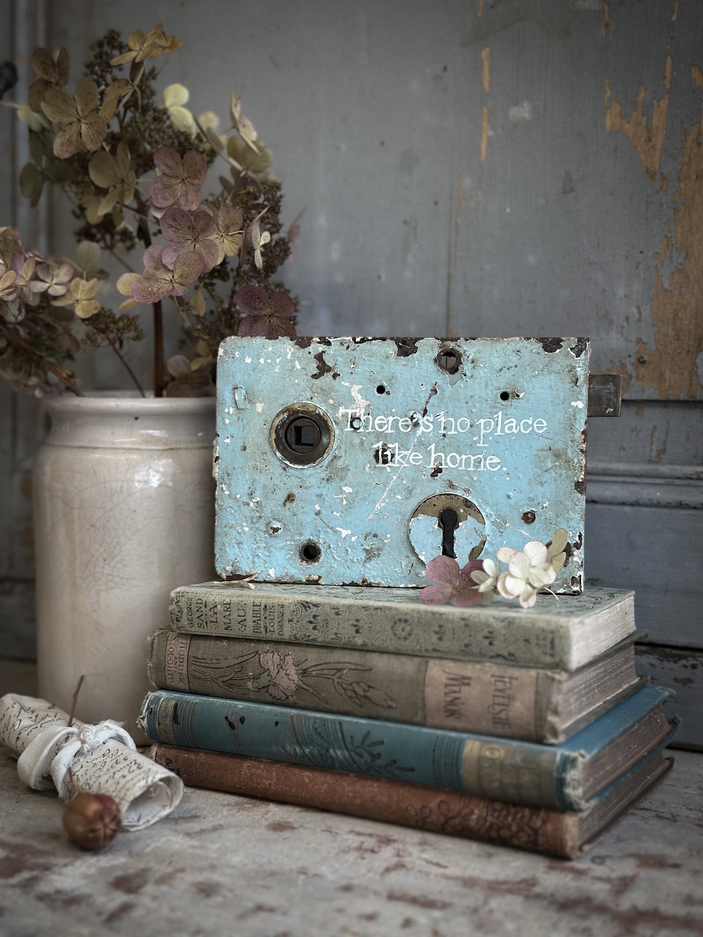 An Antique Lock With Hand Painted Quote