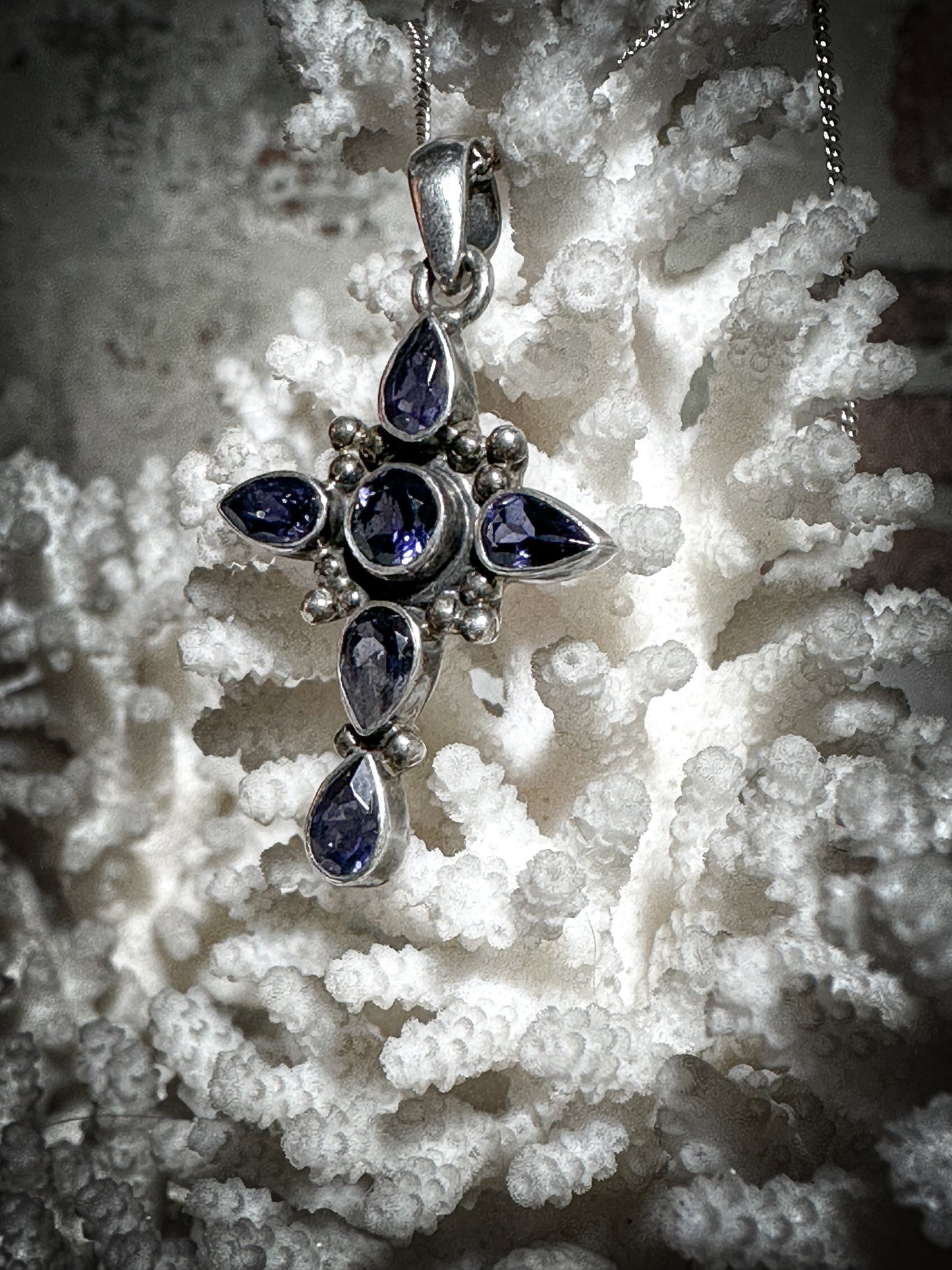 A vintage silver and Tanzanite crucifix