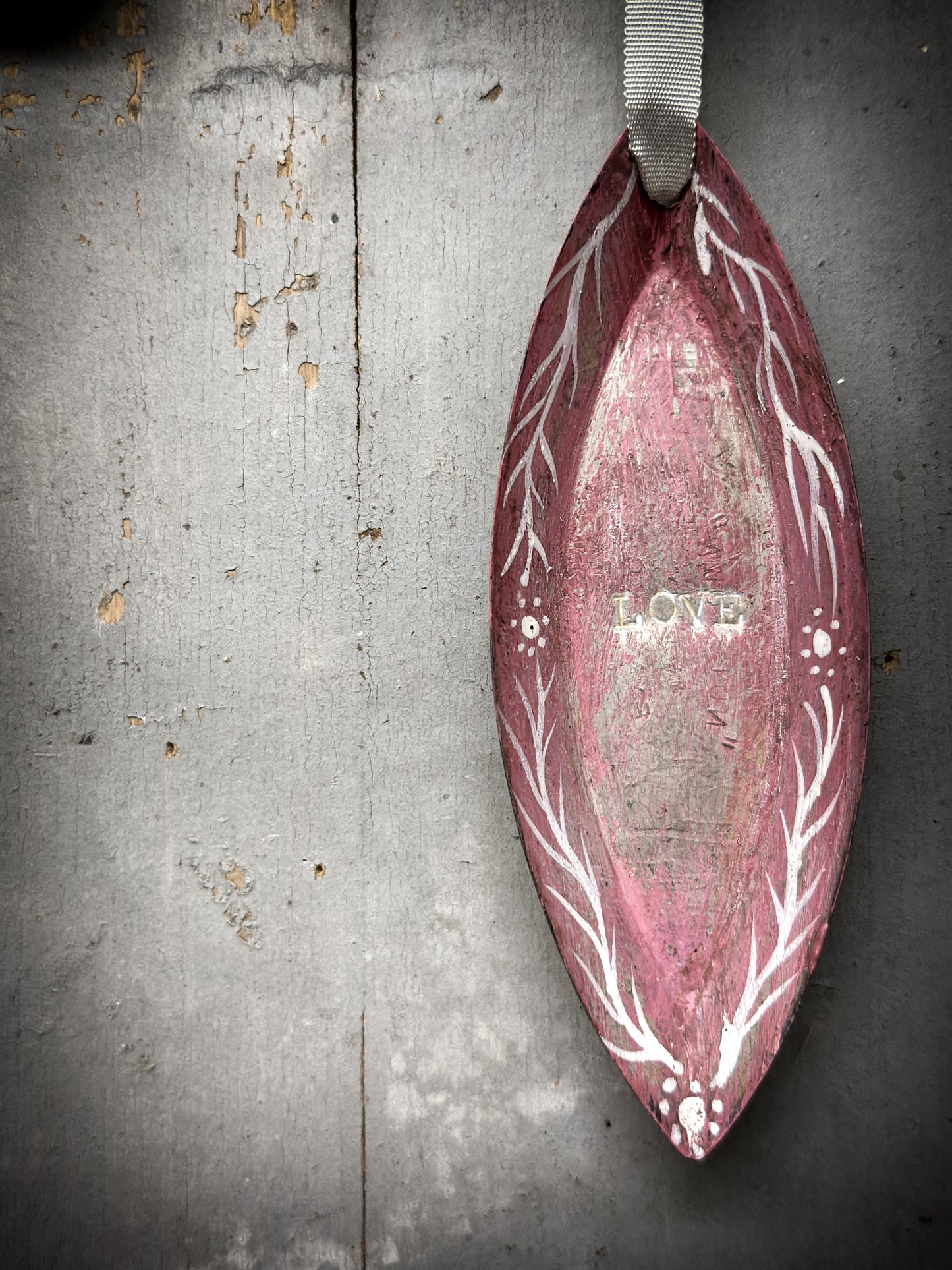 A Reworked French Patisserie Tin Christmas Decoration Stamped and Painted “love”