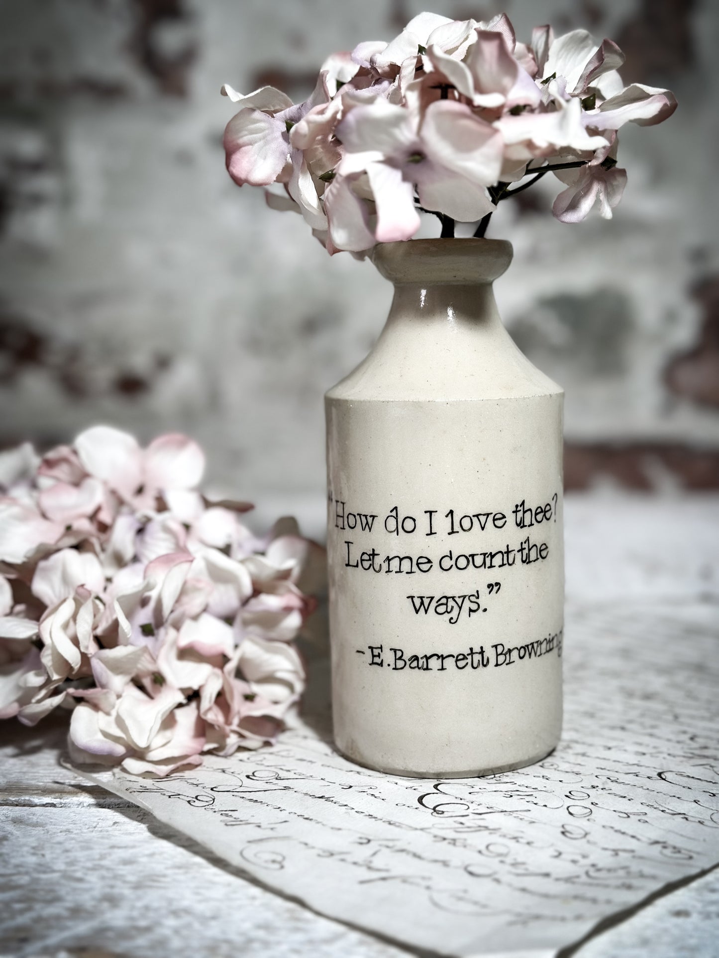 An Antique Pottery Bottle with a Hand Painted Valentine’s Day Quote