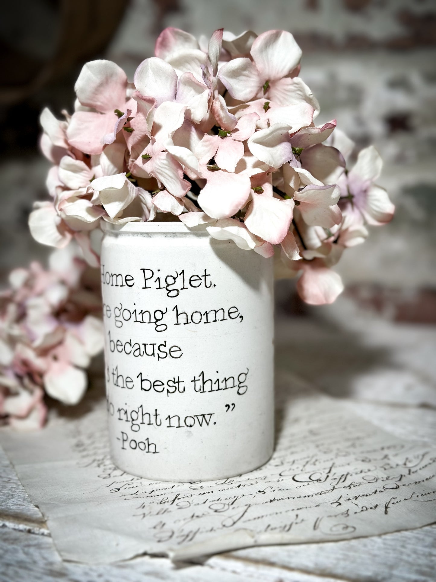 An Antique Jar with a Hand Painted Inspirational Quote