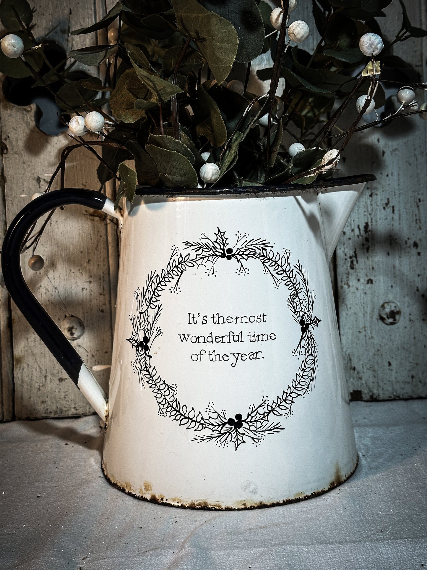 A hand painted quote on a beautiful Vintage white enamelware jug