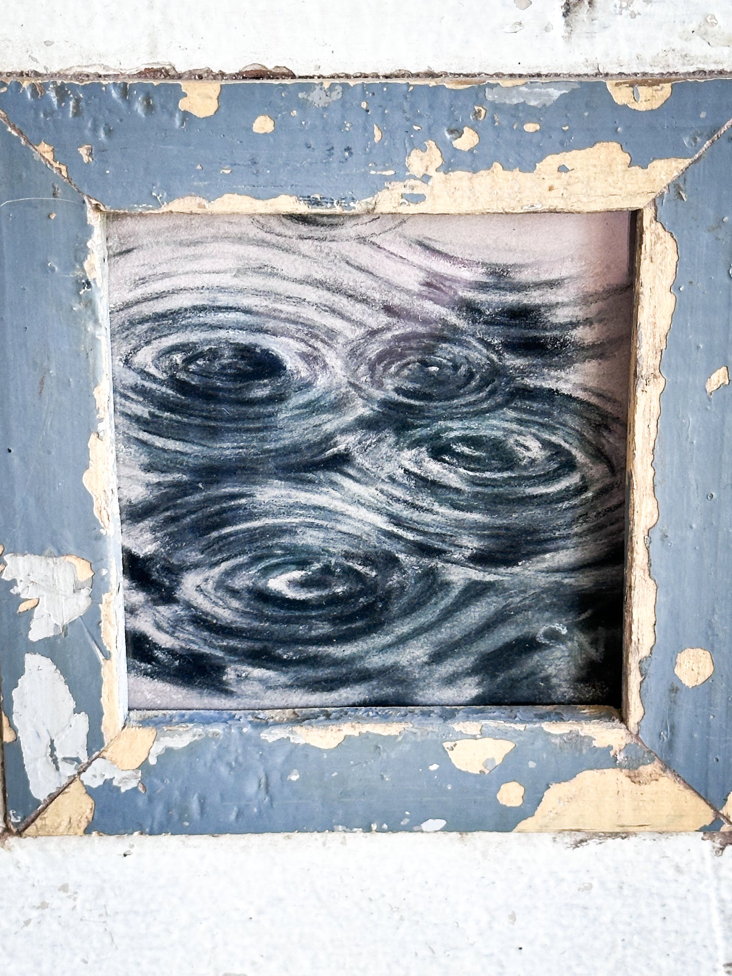 An original artwork by Steven Nicholas “Ripples in a Puddle”