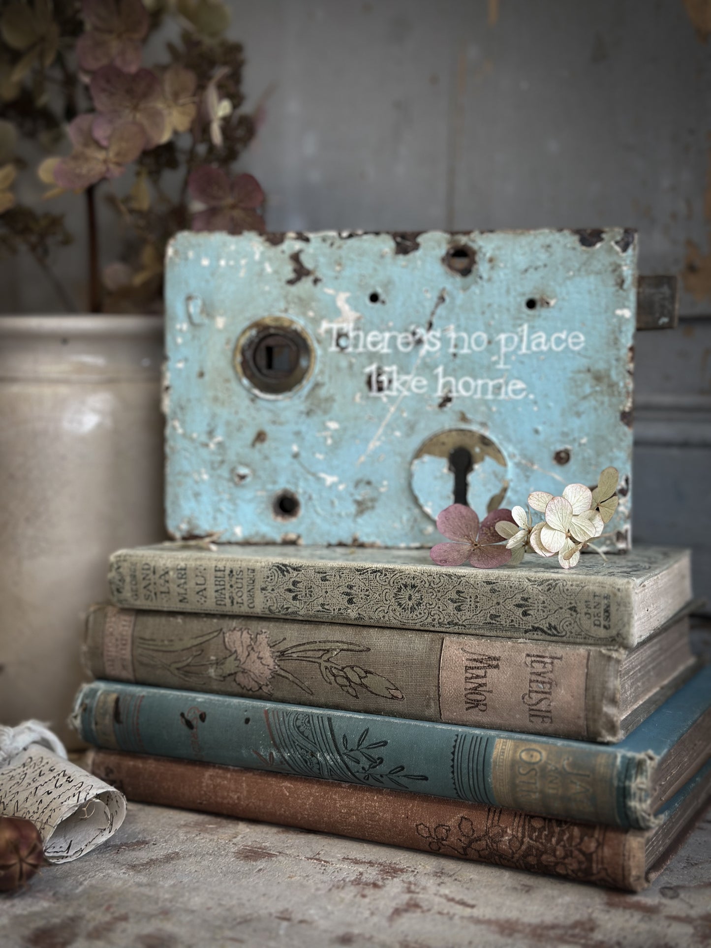 An Antique Lock With Hand Painted Quote