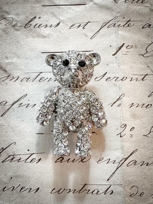A sweet vintage diamanté teddy bear brooch