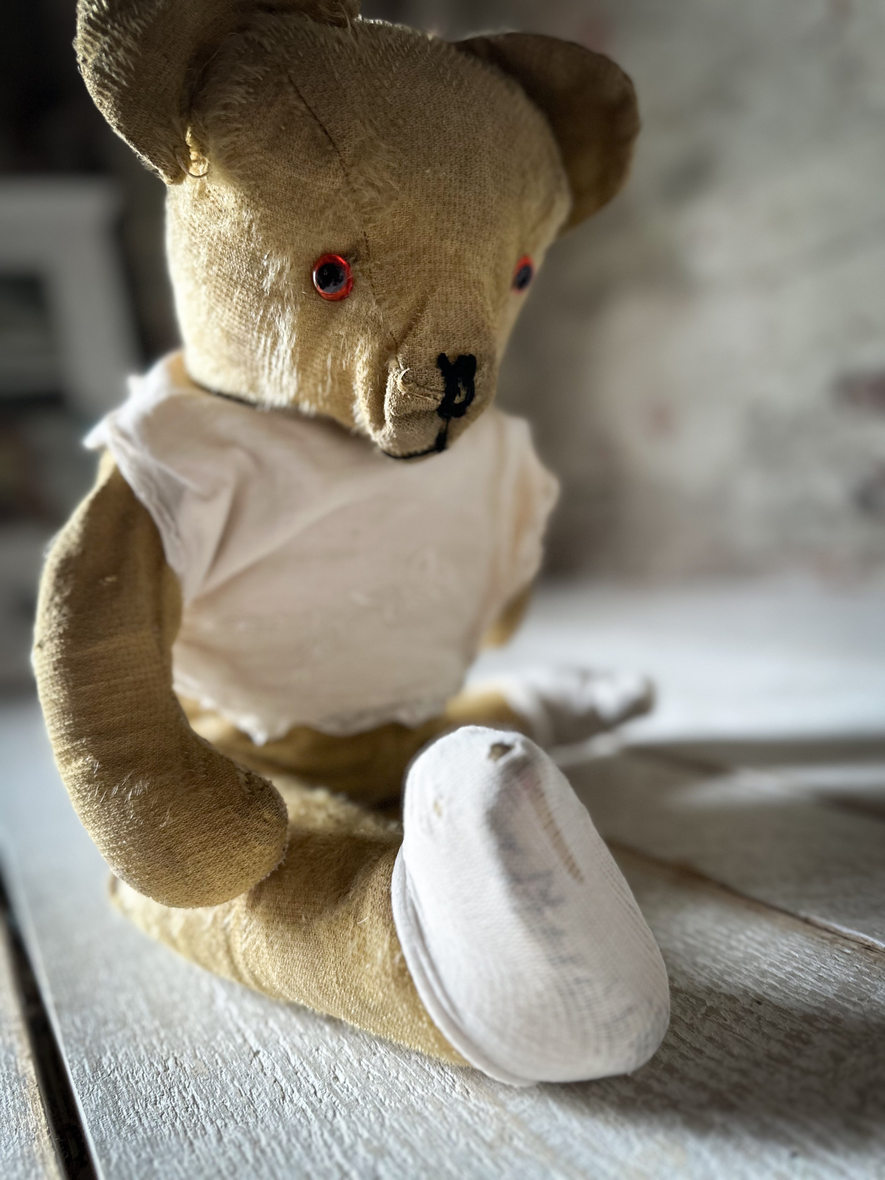 A wonderful well loved antique French teddy bear
