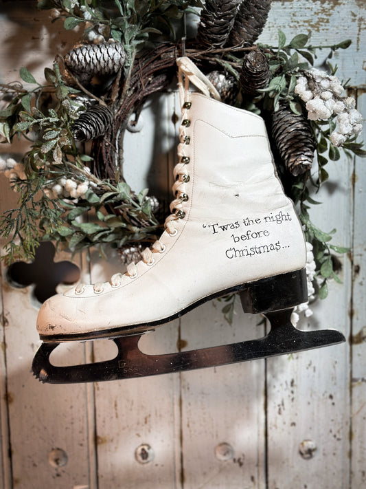 A beautiful vintage Christmas ice skate hand painted using traditional sign writer’s techniques and materials